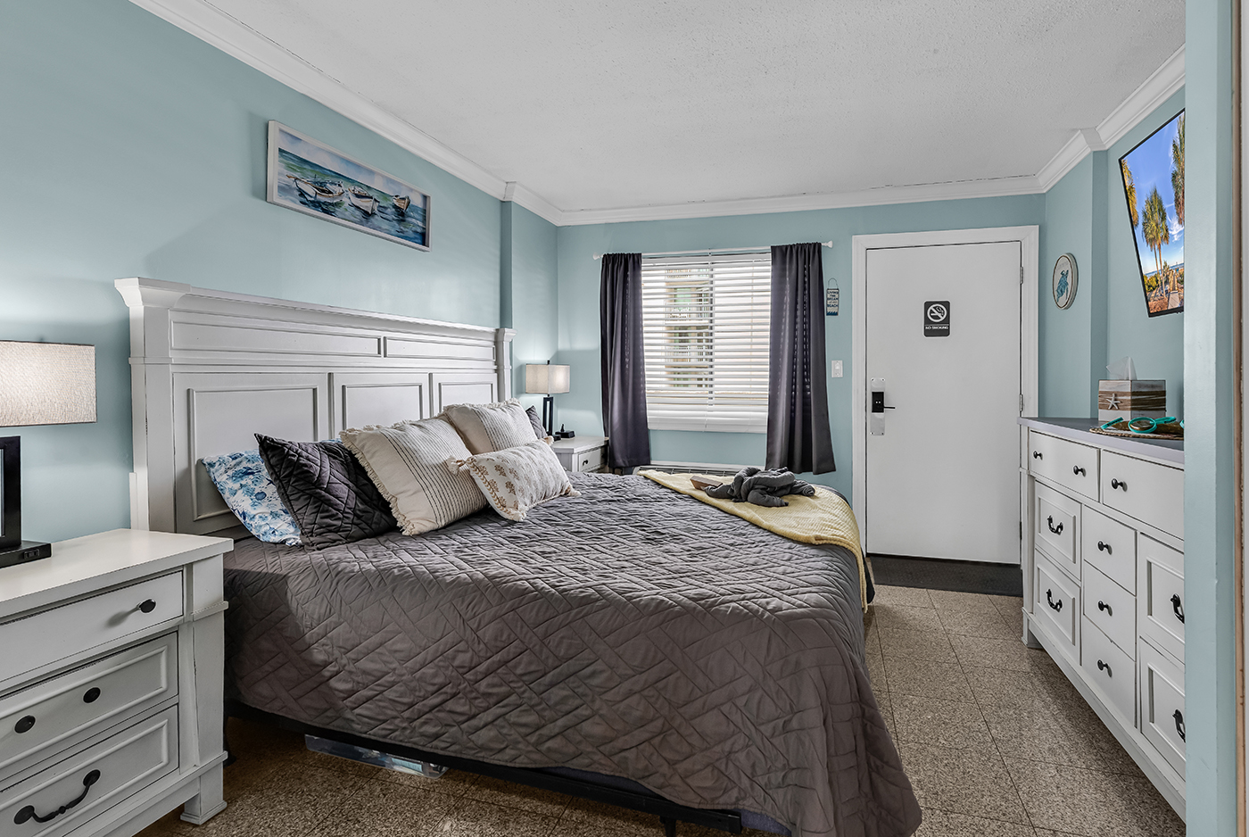 Freshly made bedroom in coastal vacation rental
